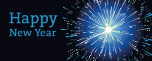 The phrase happy new year is written in a plain blue font. Behind it and to the right there are fireworks exploding in a dazzle of blue and white light. 