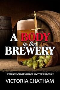 Book cover for A Body in the Brewery by Victoria Chatham. Image on cover shows a tiny sword propped up between a glass mug of beer and a bunch of green grapes. 