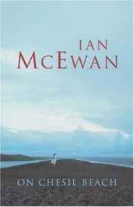 Book cover for On Chesil Beach by Ian McEwan. Image on cover is a realistic drawing of an empty road and a blue sky above it with only a few white clouds in it.